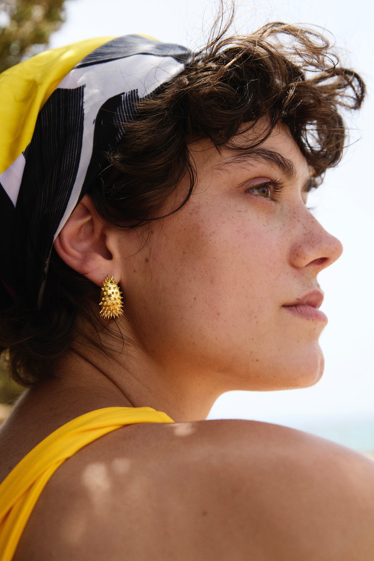 Feggeri Ahinos Gold Vermeil Spike Earrings worn by a model