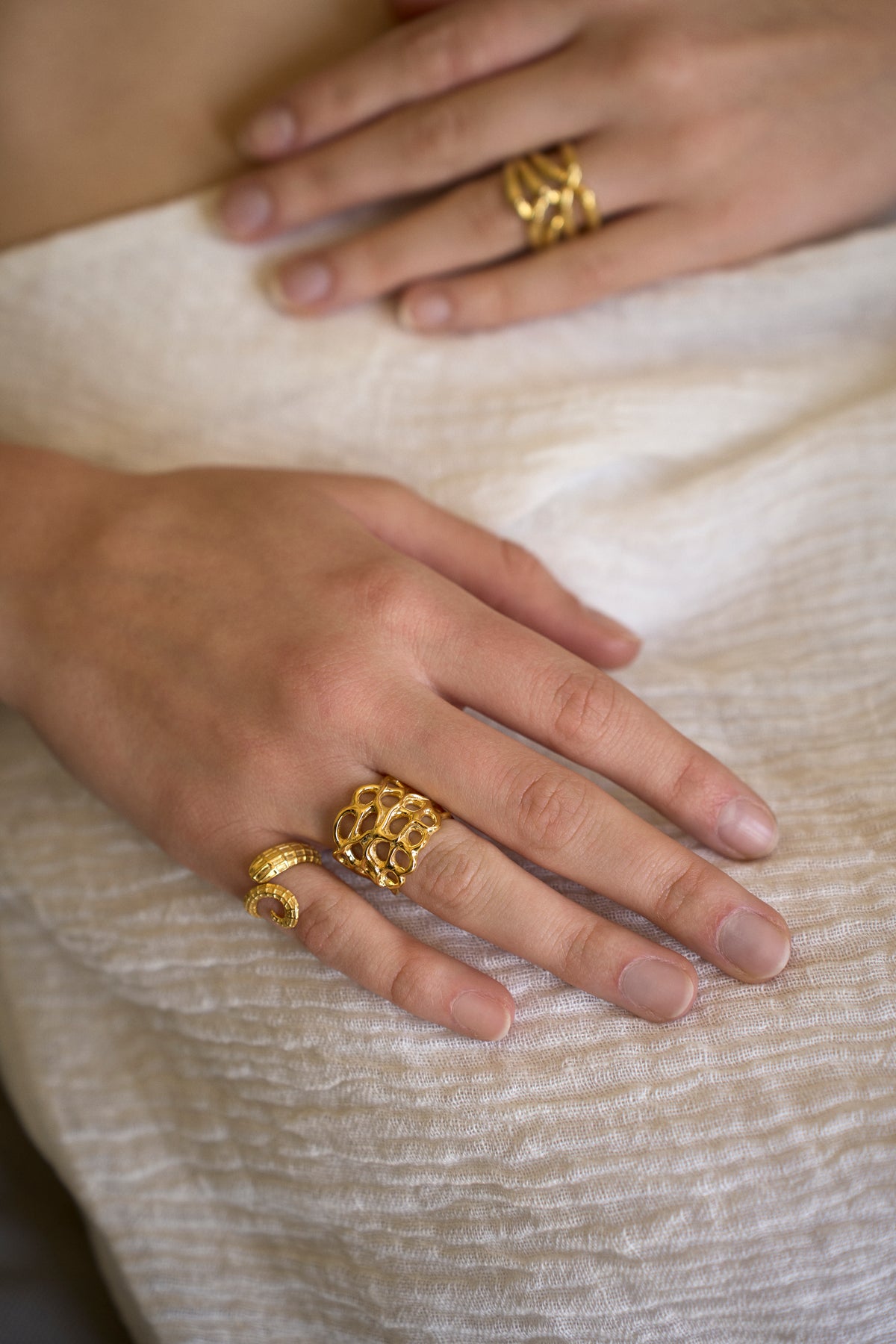 Feggeri Astra Gold Vermeil Starfish Coral Ring worn by a model