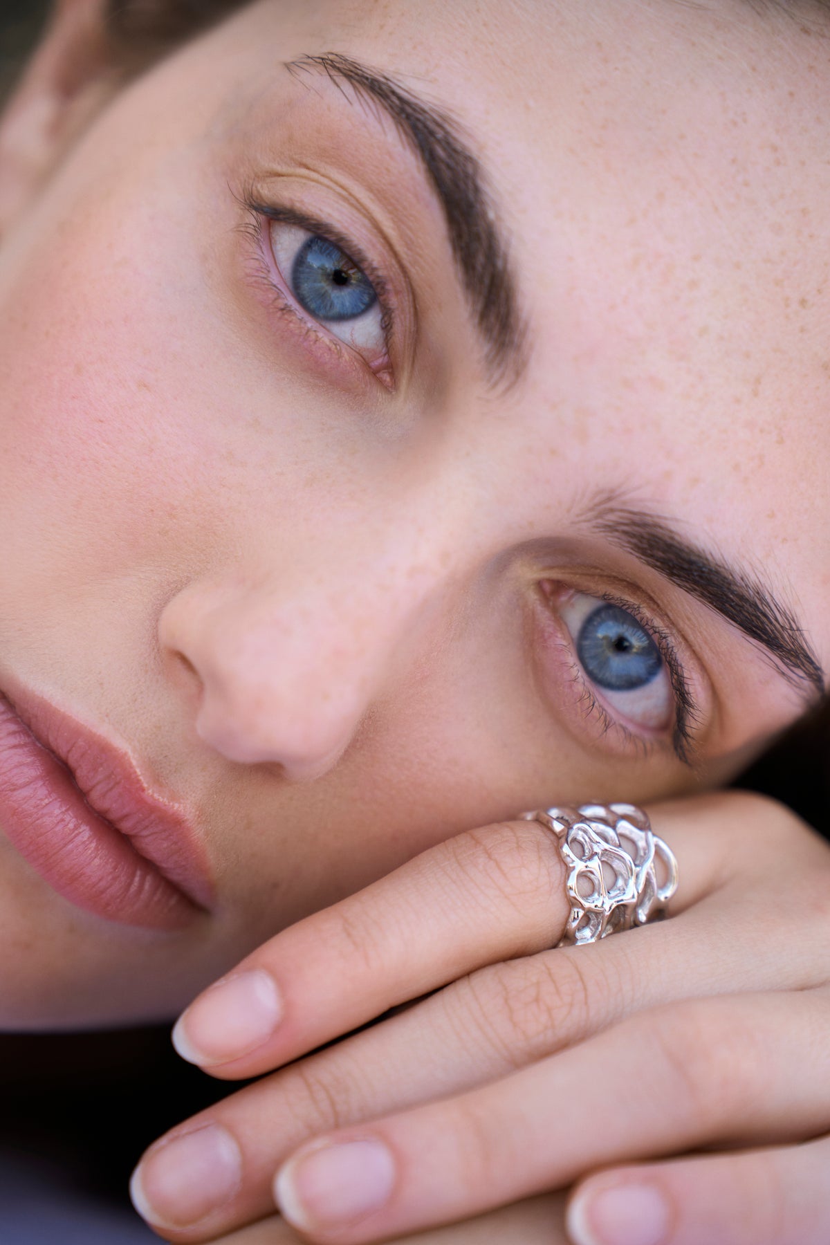 Feggeri Astra Sterling Silver Starfish Coral Ring worn by a model