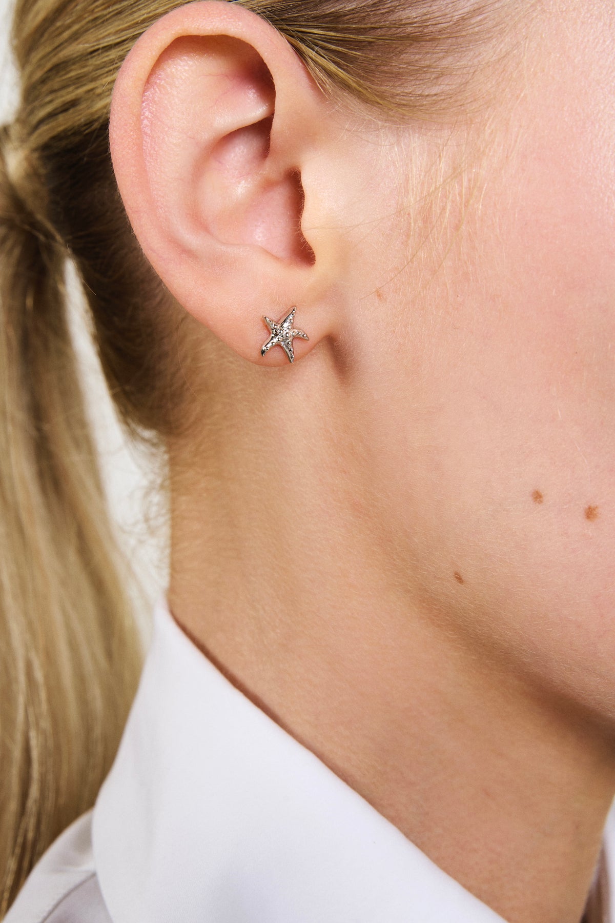 Feggeri Astra Sterling Silver Starfish Stud Earrings worn by a model