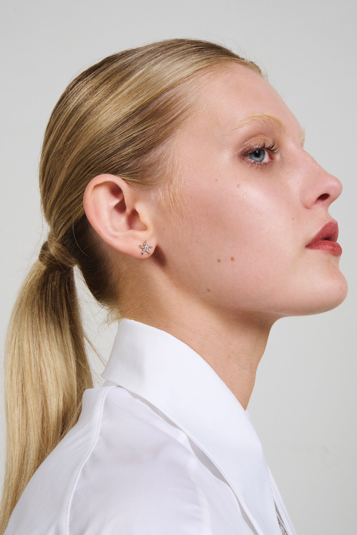 Feggeri Astra Sterling Silver Starfish Stud Earrings worn by a model