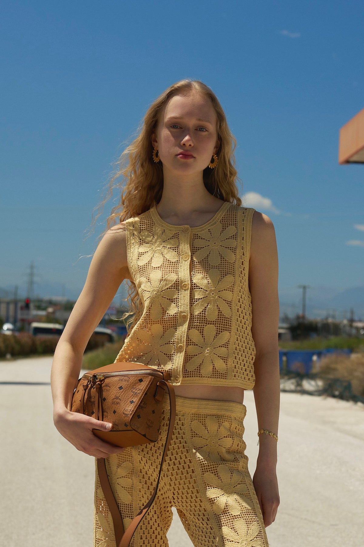 Feggeri Ippos Gold Vermeil Fin Statement Earrings worn by a model