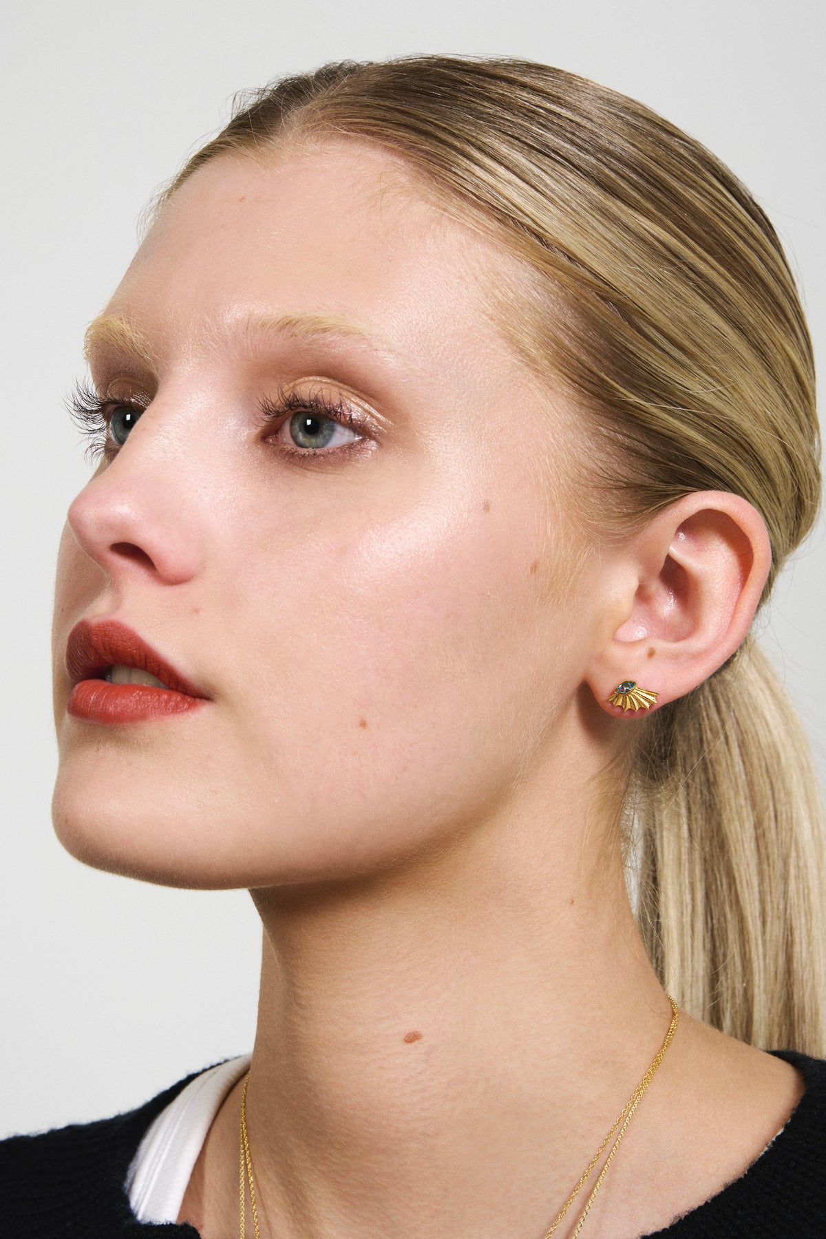 Feggeri Ippos Gold Vermeil Topaz Stud Earrings worn by a model