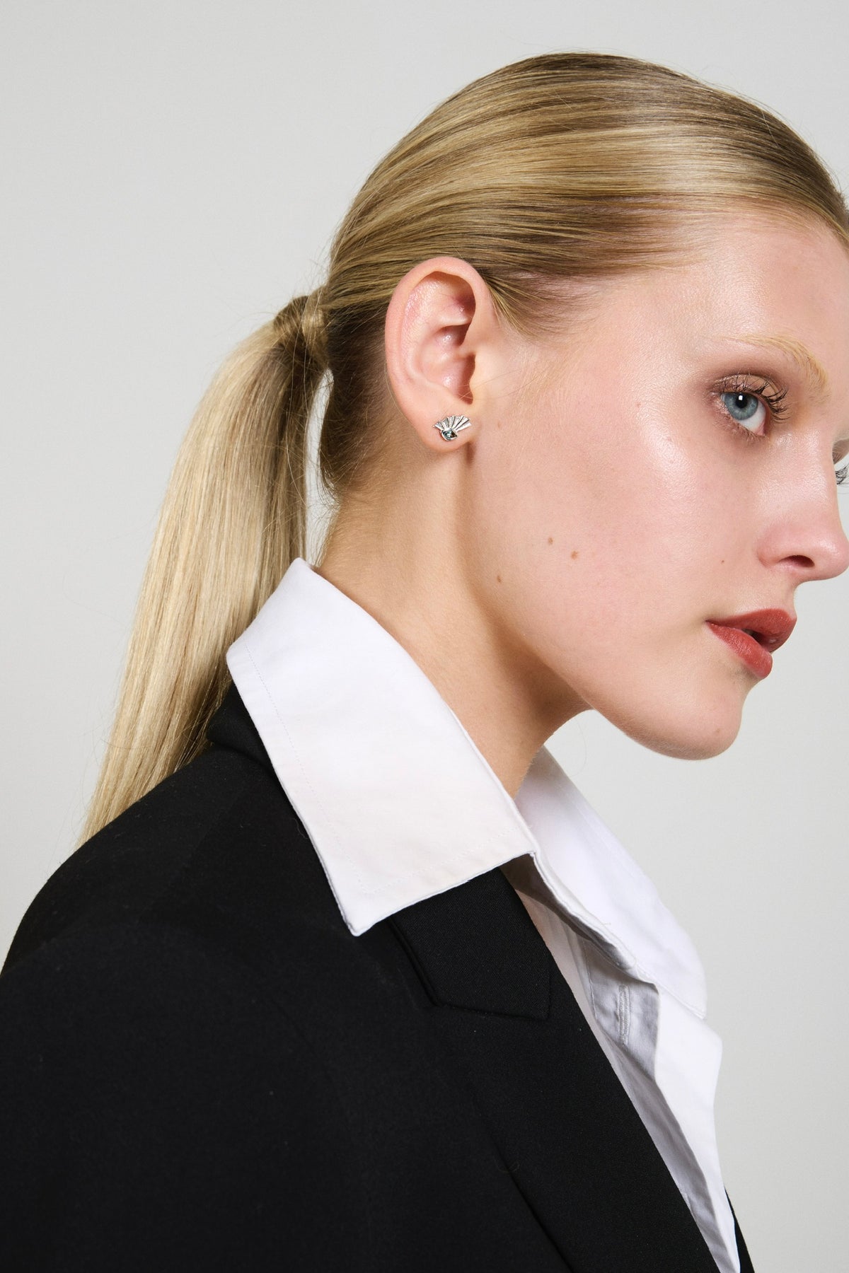 Feggeri Ippos Sterling Silver Topaz Stud Earrings worn by a model