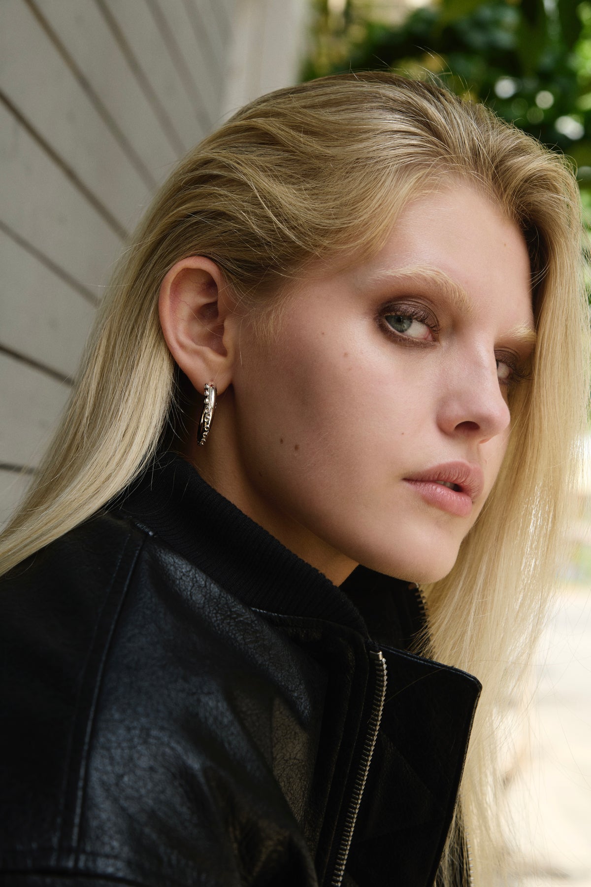 Feggeri Okto Sterling Silver Large Hoop Earrings worn by a model