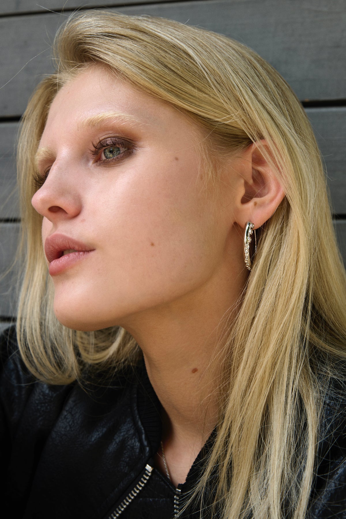 Feggeri Okto Sterling Silver Large Hoop Earrings worn by a model