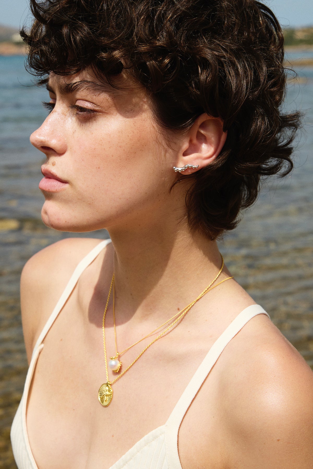 Feggeri Okto Sterling Silver Octopus Stud Earrings worn by a model