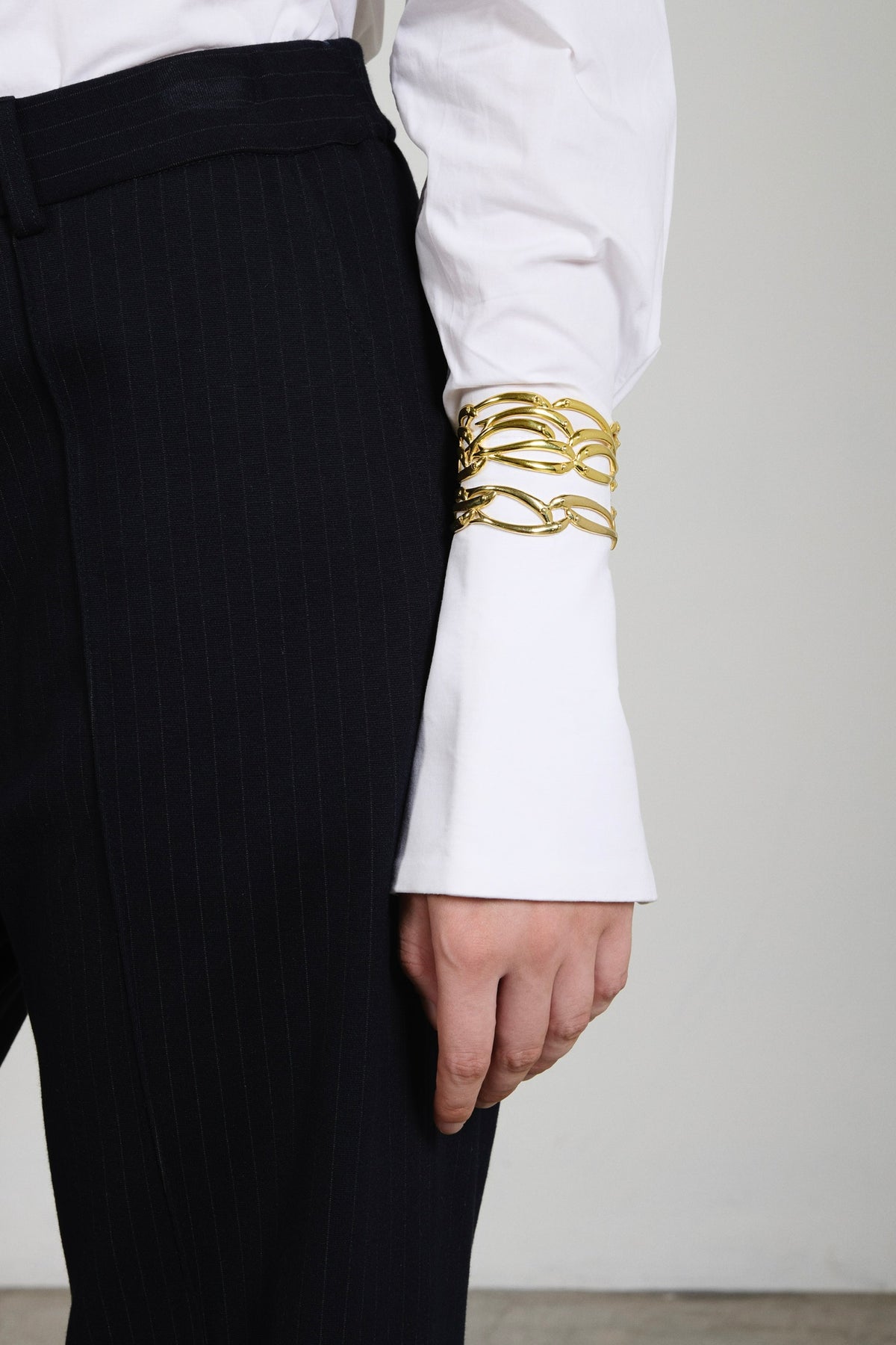 Feggeri Psari Gold Vermeil Large Fish Cuff Bracelet worn by a model