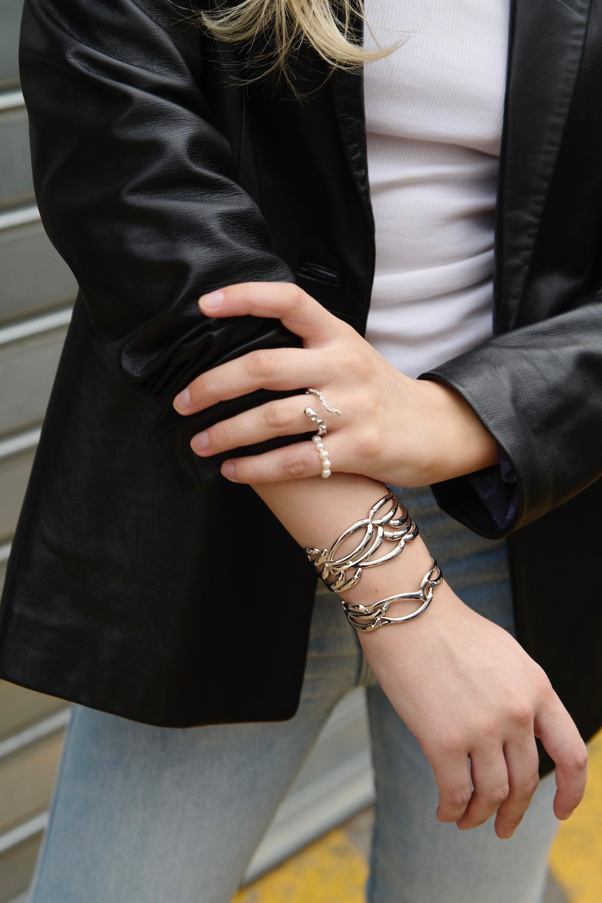 Feggeri Psari Sterling Silver Mini Fish Cuff Bracelet worn by a model
