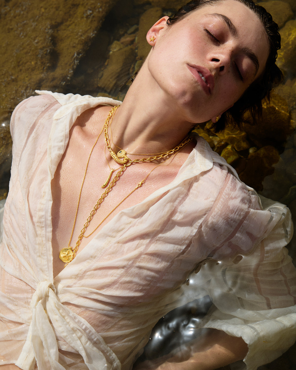 Feggeri Psari Gold Vermeil Fish Necklace worn by a model