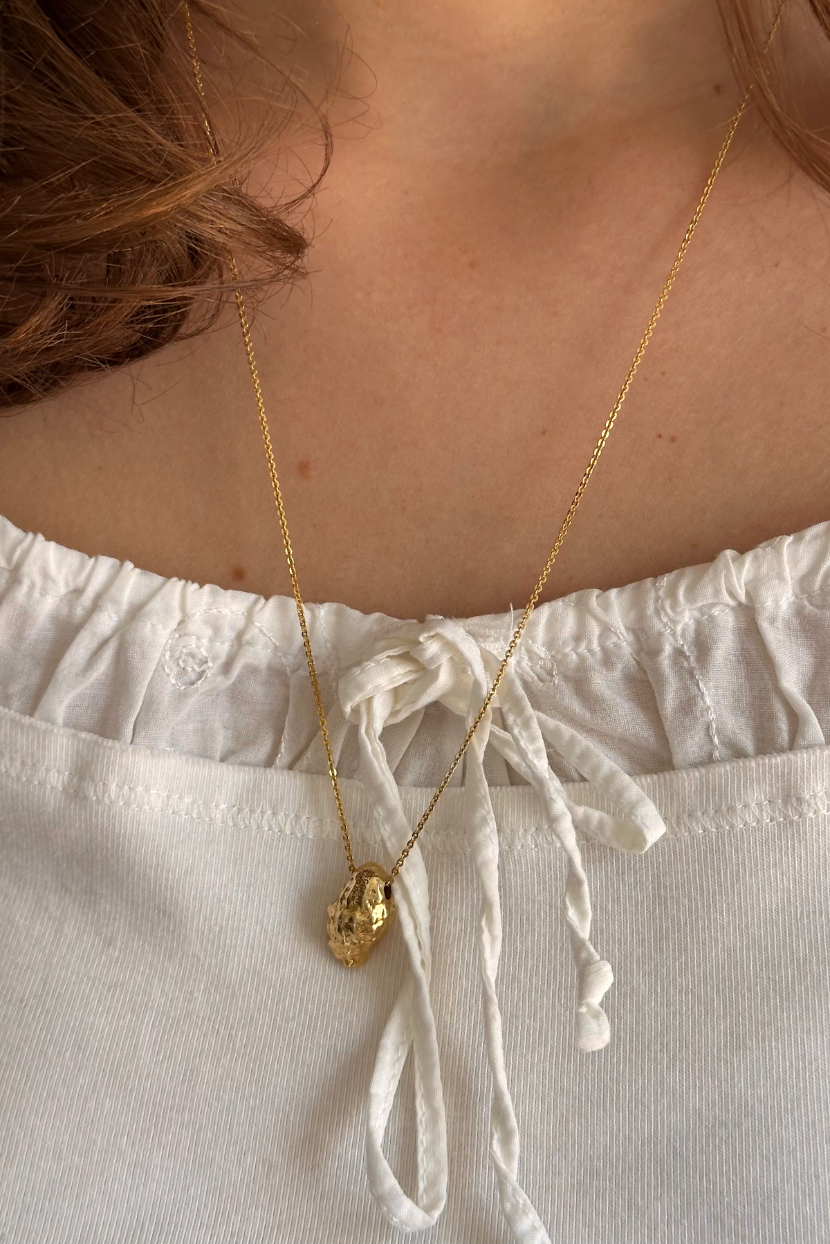 Feggeri Conch Shell Gold Vermeil Necklace worn by a model